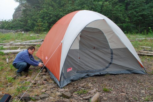 George Burden setting up camp