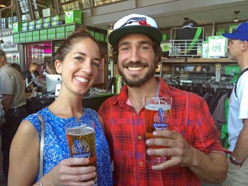 Dale & Lenore enjoying a Steam Whistle with a Toronto Blue Jays hat