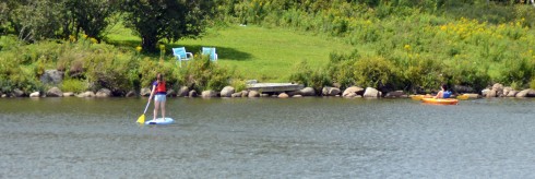 Paddle Boarder and Kayaker on Governor Lake