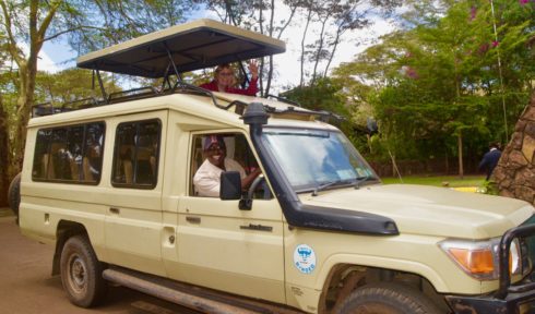 Alison in the Toyota with driver/guide William