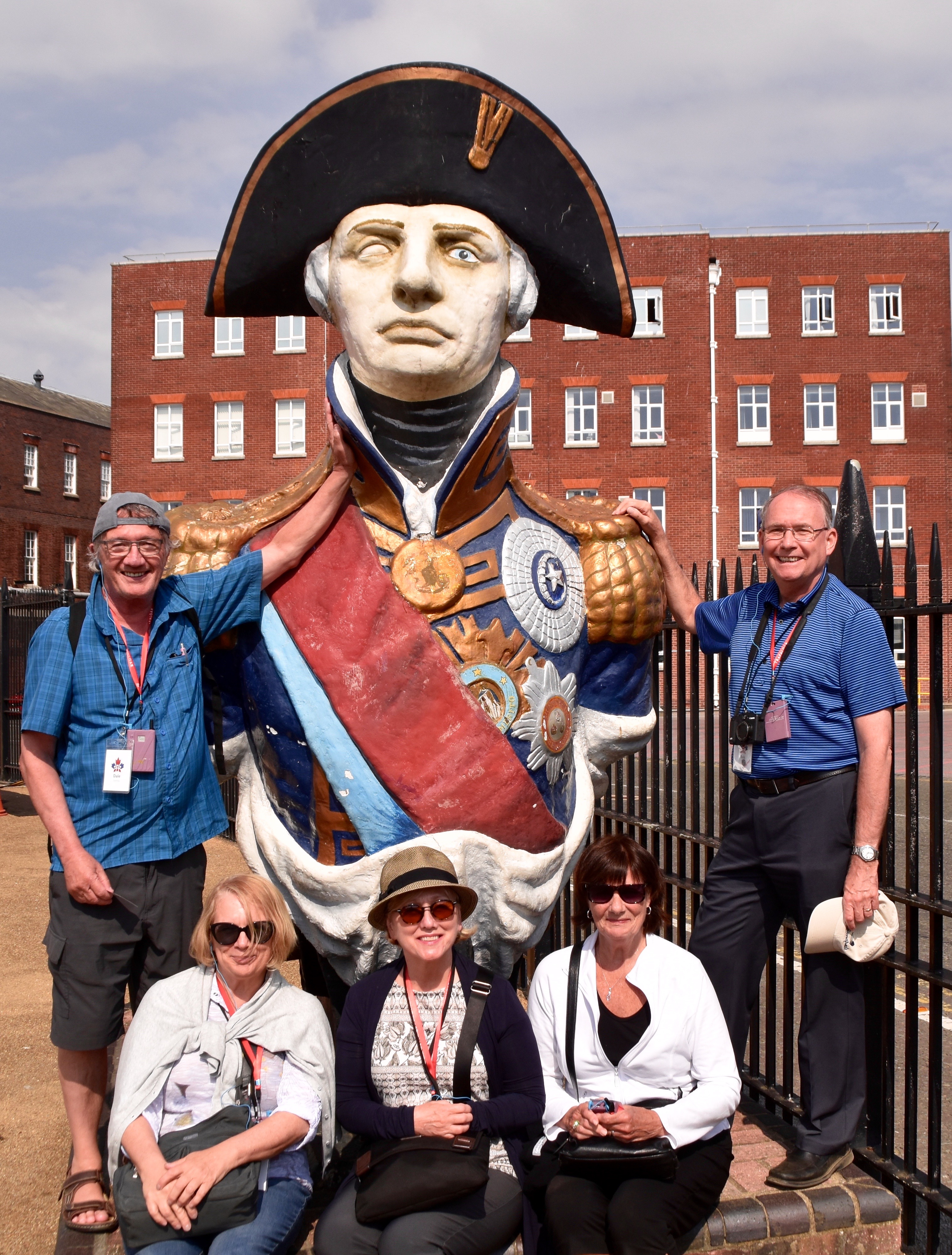 With Lord Nelson beside HMS Victory