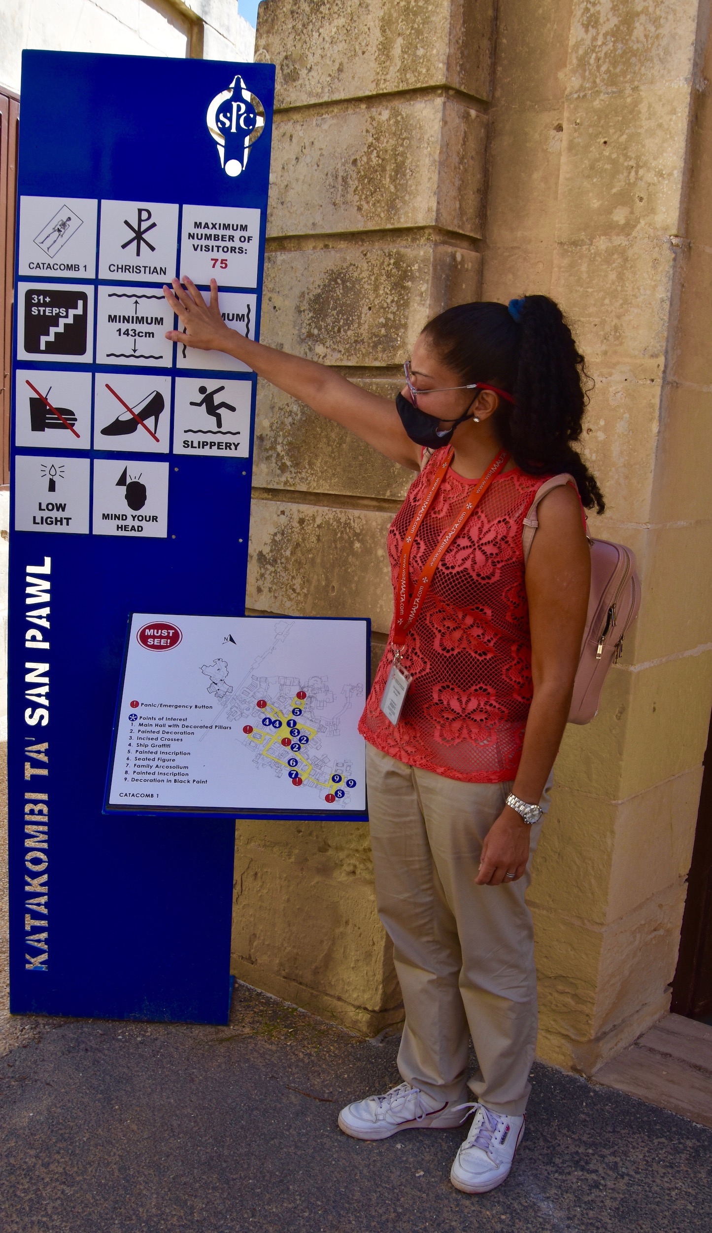 Chantelle at the Entrance to the First Catacomb of St. Paul in Malta