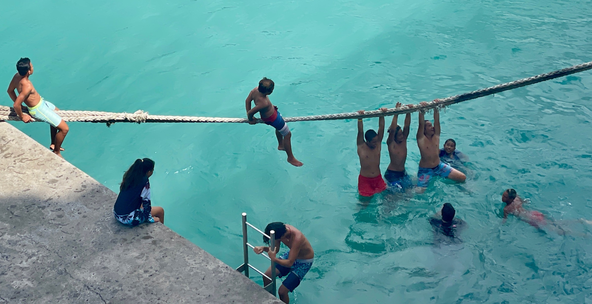 Kids Having Fun at Oa Pou, French Polynesia.