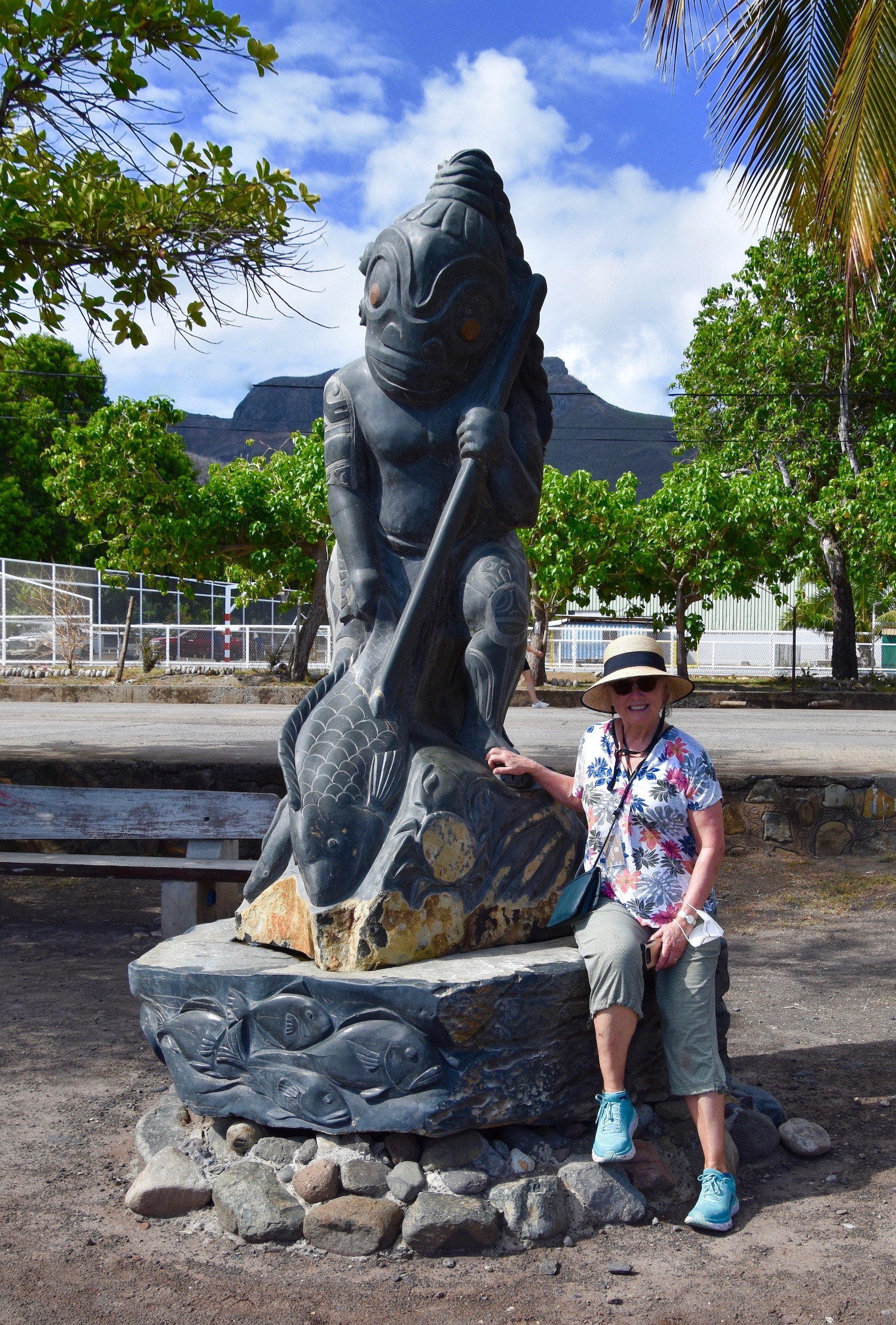 Alison with a Sea Moai on Hakahau Waterfront, Ua Pou