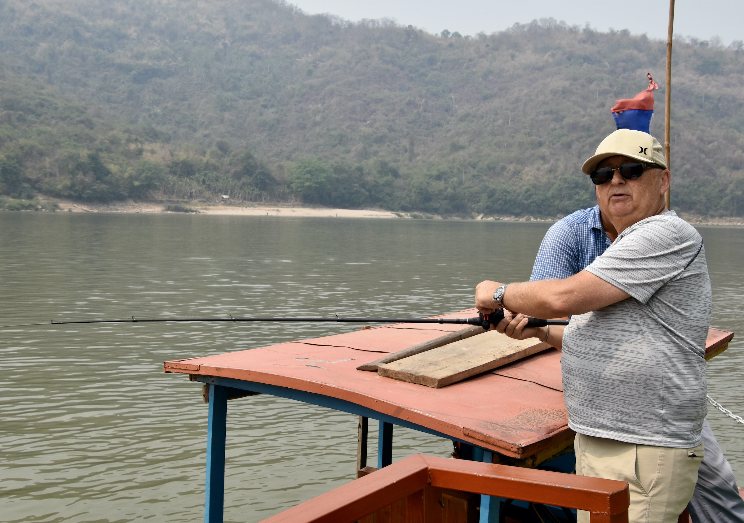 Claude Casts a Line in the Mekong River