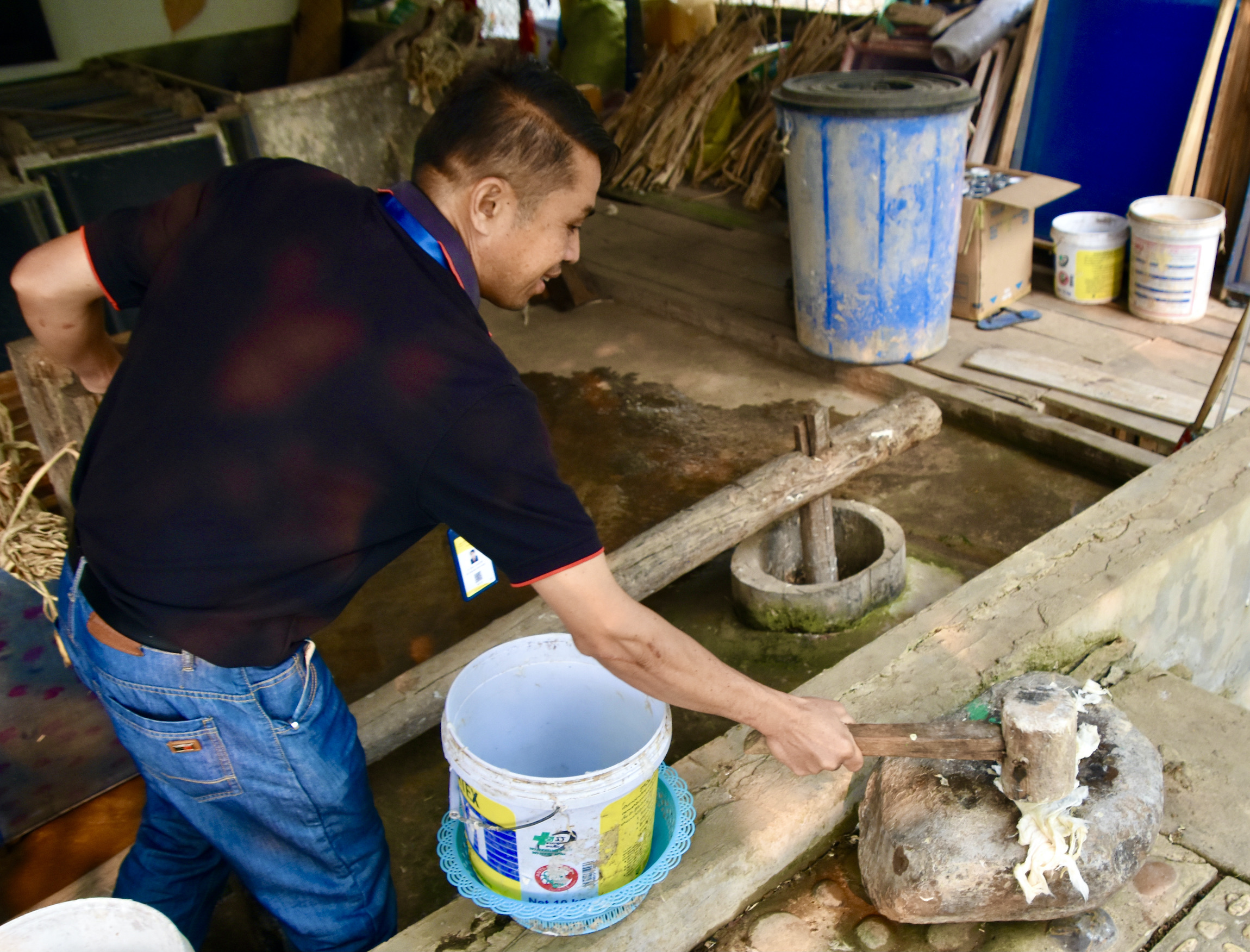 a Wielding the Flattening Mallet before the Mekong River Cruise