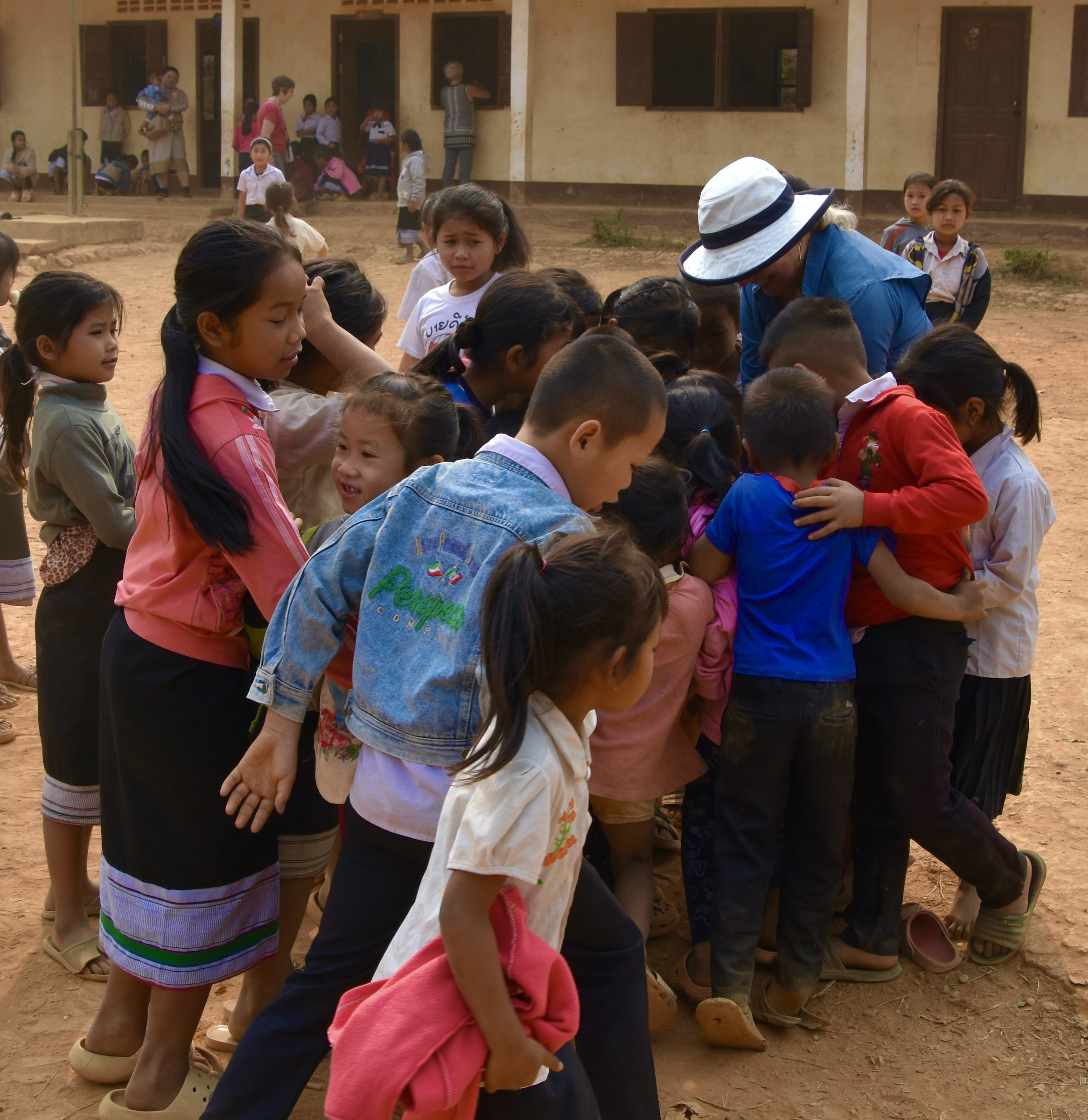 Alison Showing the Photos to the Khmu Children
