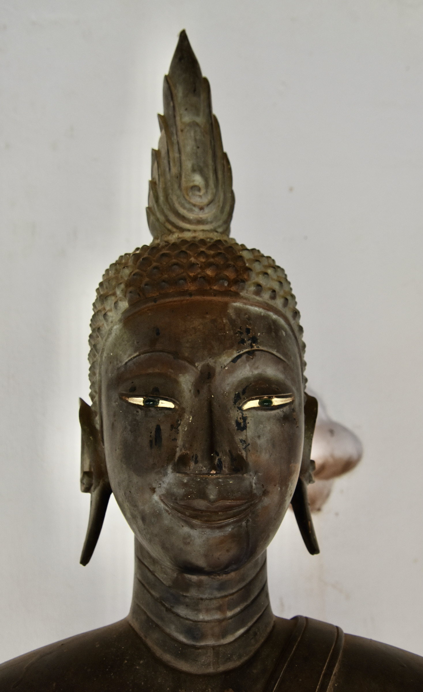 Head of a Buddha in the Great Stupa Courtyard, Vientiane