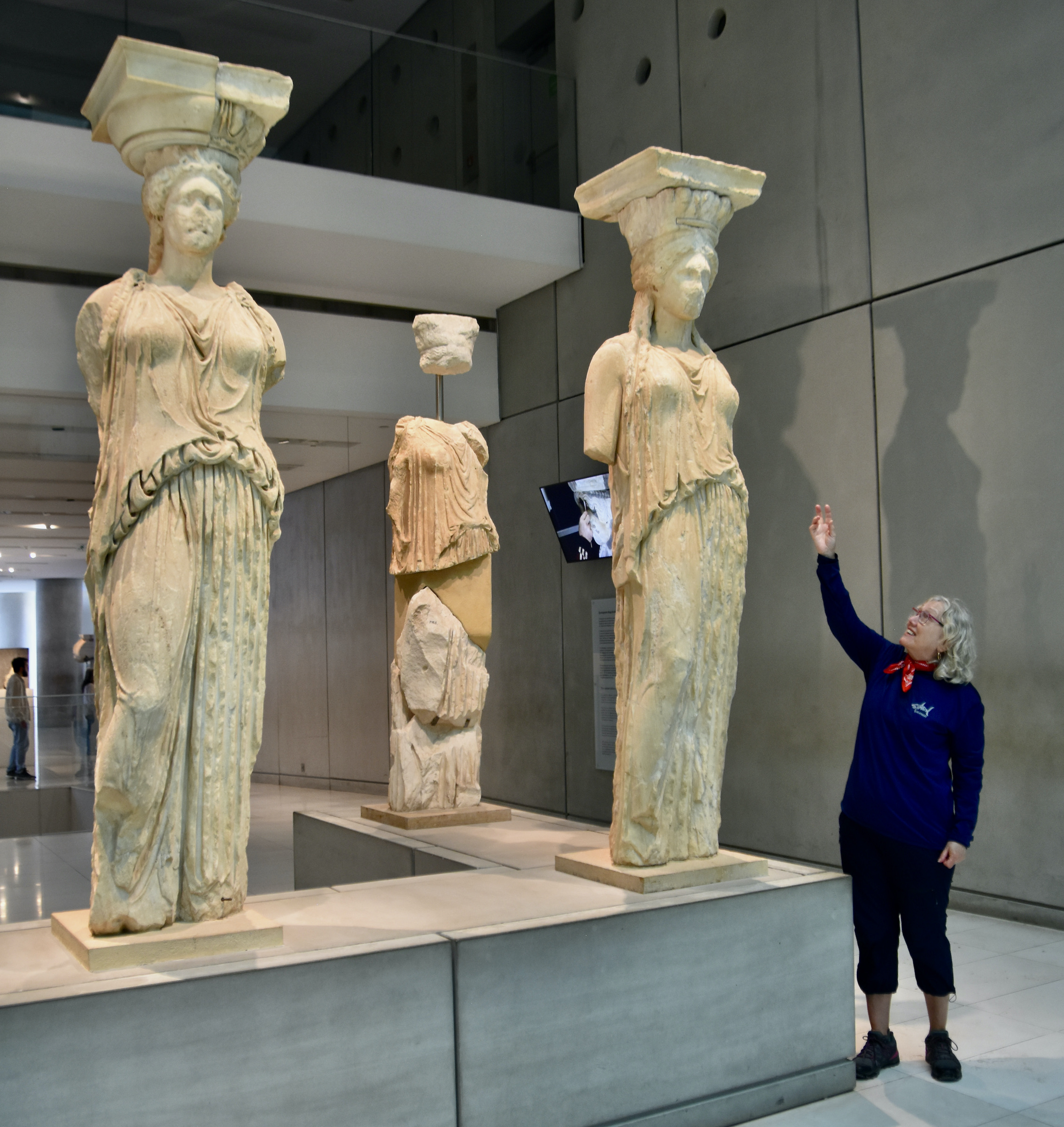 Alison with Three Caryatids, the Acropolis Museum