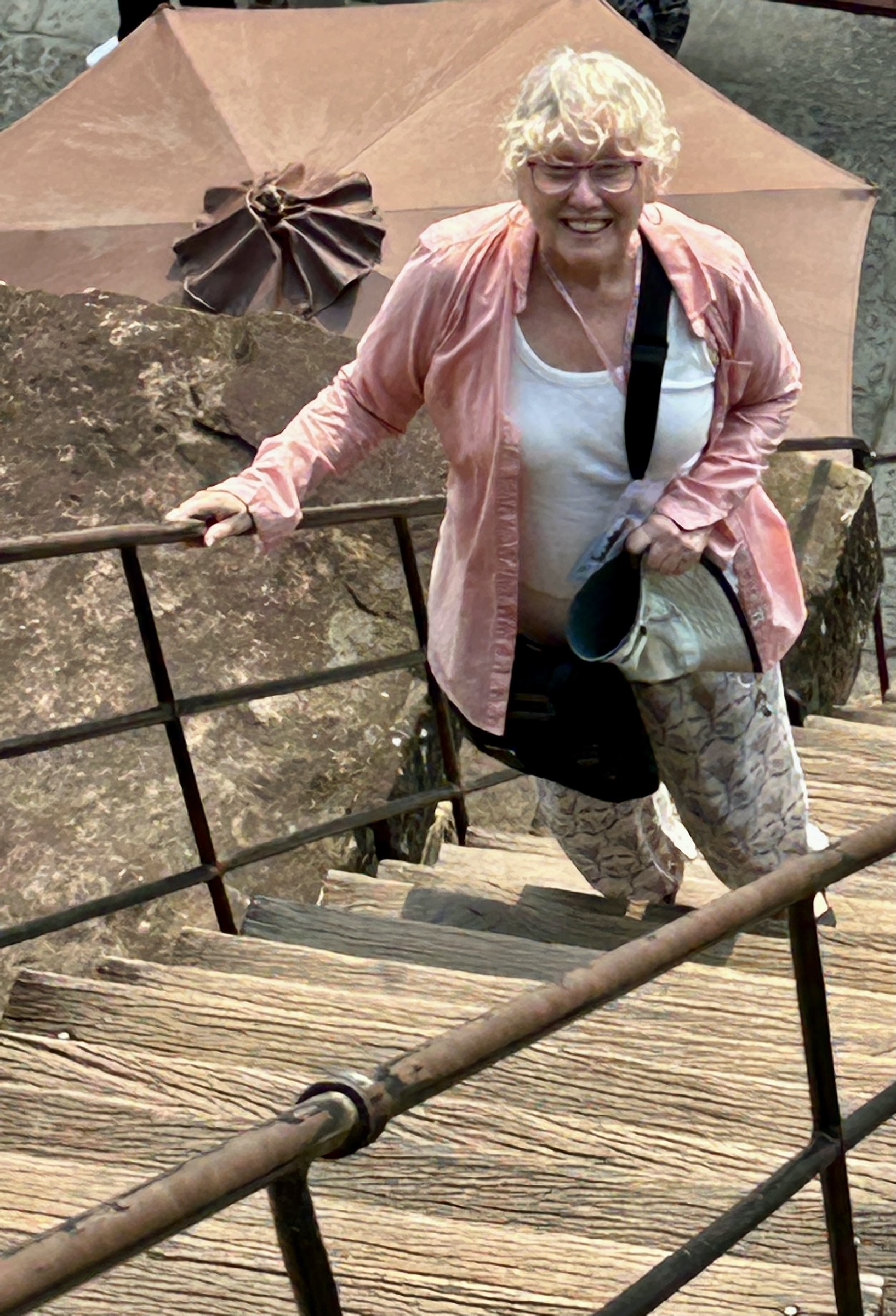 Alison Climbing to the Top of Angkor Wat